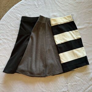 Bundle of 3 skirts size small black, gray and stripped